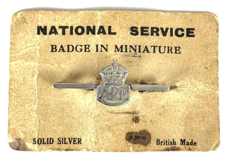 Air Raid Precautions miniature silver ARP mufti badge on original card