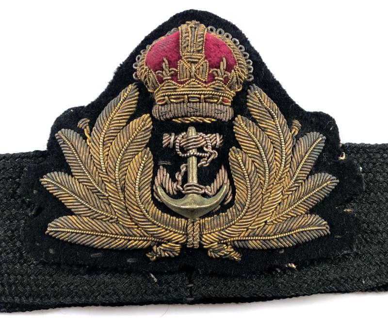 Royal Navy Officers gold bullion cap badge on original hat band