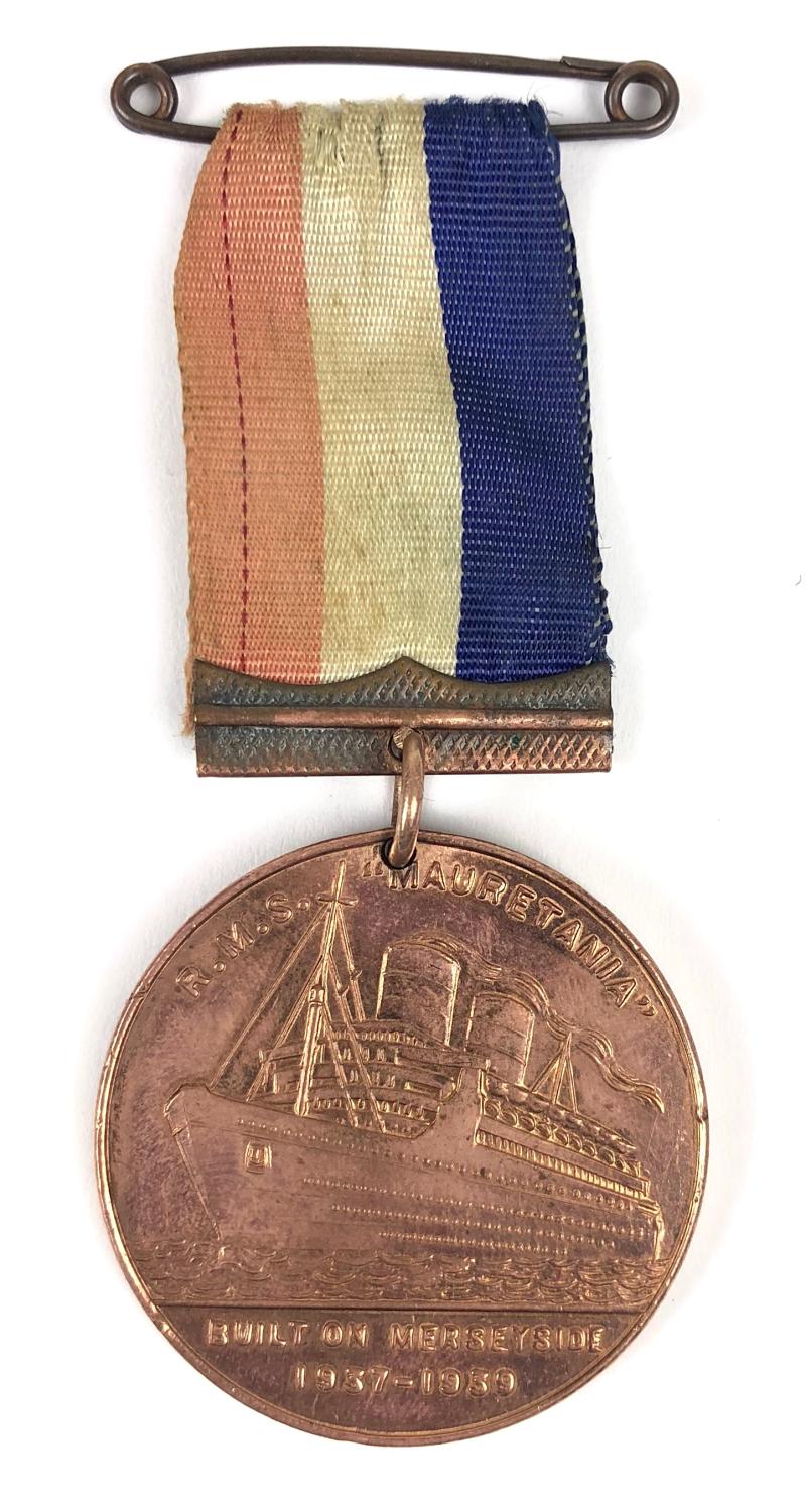 RMS Mauretania medal struck from the metal of the old ship 1906 -1935