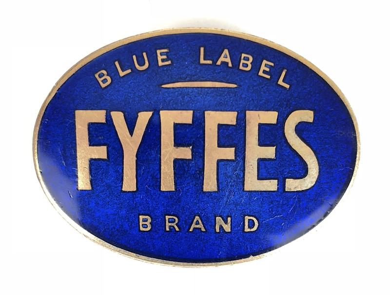 FYFFES Blue Lapel Brand Bananas Advertising Cap Badge by L.Simpson & Co