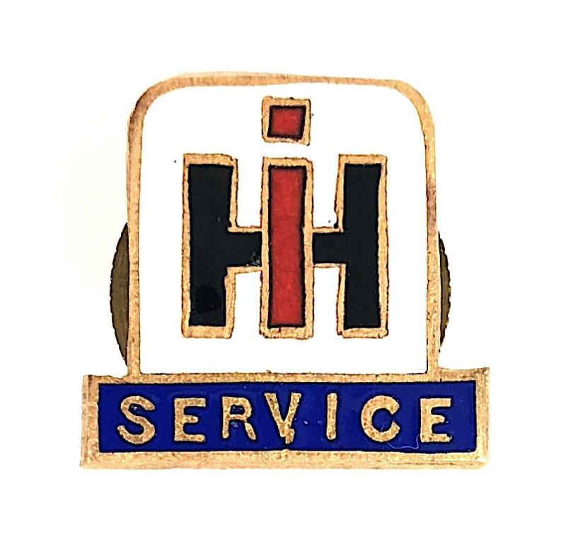 International Harvester Service tractors & agricultural screw back badge 1902 -1985