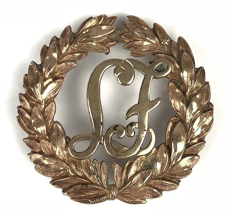 Legion of Frontiersmen First Pattern brass hat badge c.1904