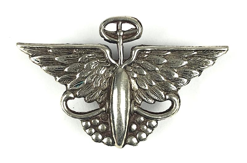 Austin Motor Company winged steering wheel advertising pin badge