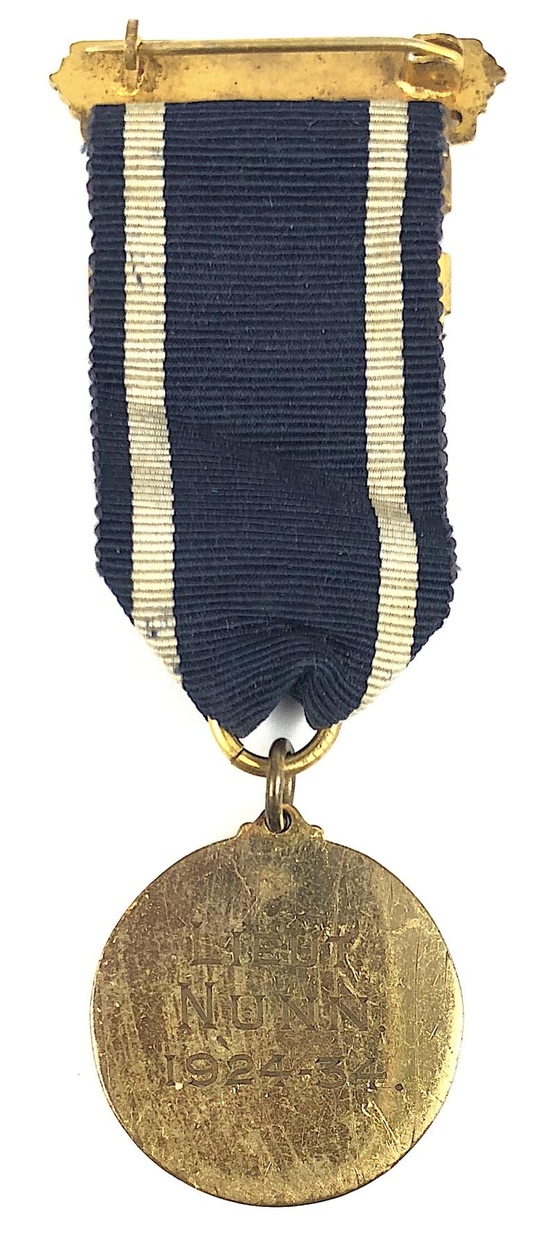 Girls Life Brigade ten years service medal Lieut Nunn 1934